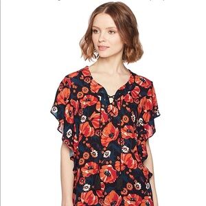 Short Flutter Sleeve Lace Up Top.